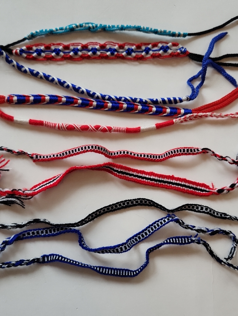 10 Handmade Woven Friendship Bracelets – Assorted Red, White, Blue, Black